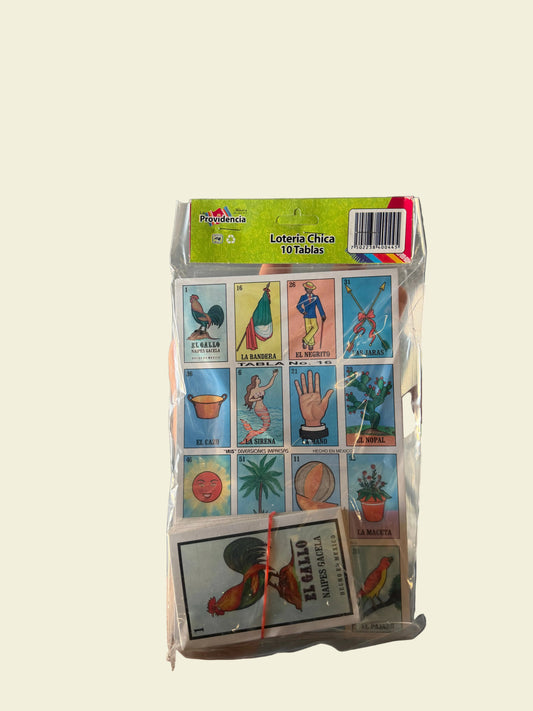Collection of vintage-style playing cards in a transparent plastic holder on a gray surface.